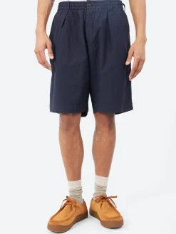 Universal Works - Pleated Track Shorts in Navy